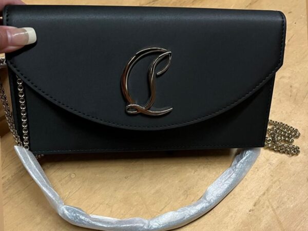 Christian Louboutin leather clutch bag